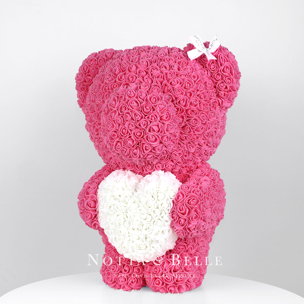 Розовый мишка из роз с белым сердцем - 55 см